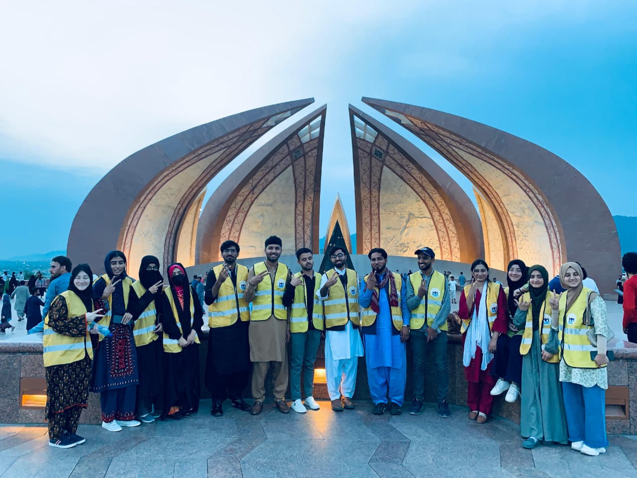 Hope Society volunteers in matching vests at a national monument